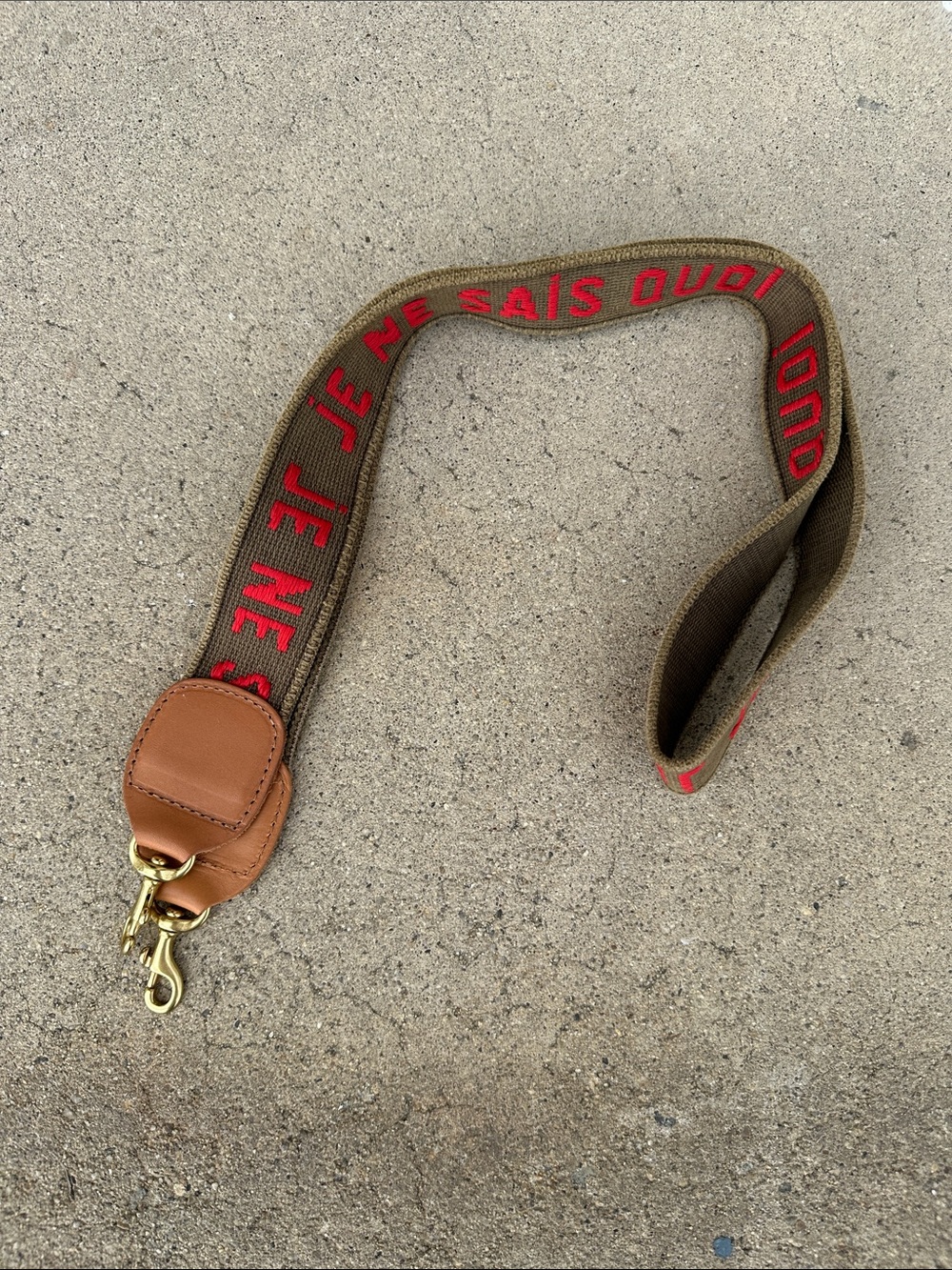 Olive Canvas Cross Body Strap with Red Script and Tan Leather Ends